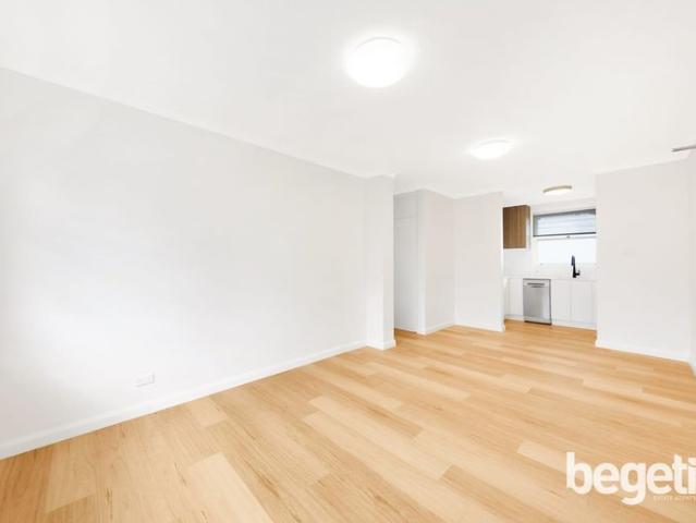 IMPECCABLE WITH SUNLIT ASPECT IN LEAFY SETTING CLOSE TO PARKLAND, STATION & SHOPPING MALL
