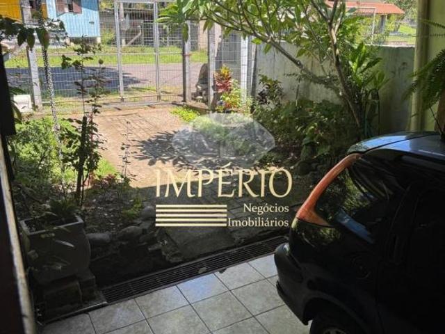 Imperdível Residência à Venda no Centro de Três Coroas RS: 2 Quartos, 1 Sala, 1 Banheiro, Garagem e