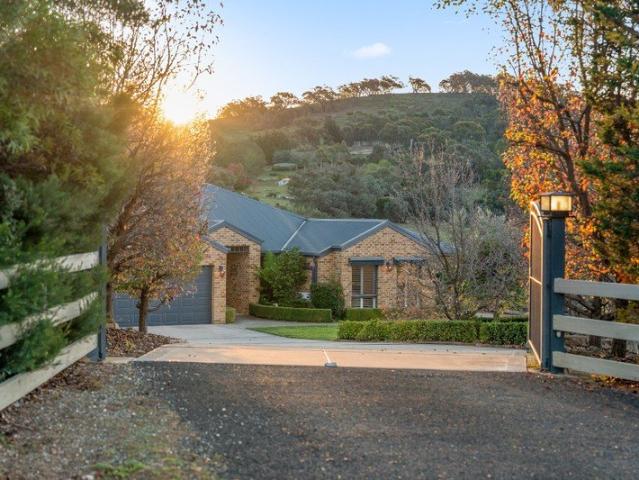 Impressive Family Acreage Offering Space, Comfort & Country Charm