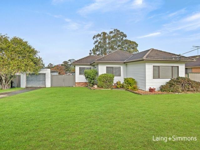 Impressive family entertainer set on a landscaped 1012sqm block