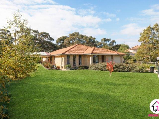 IMPRESSIVE FAMILY HOME ON OVER 7.5 ACRES