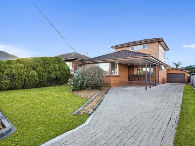 Impressive Family Residence in a Commanding Vantage Location with a Sparkling Inground Swimming Pool and Mount Kembla Views