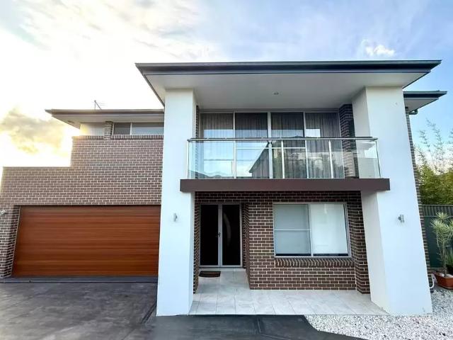 Impressive Family Residence with Six Bedrooms, Multiple Living Areas & Mountain Views + Solar!
