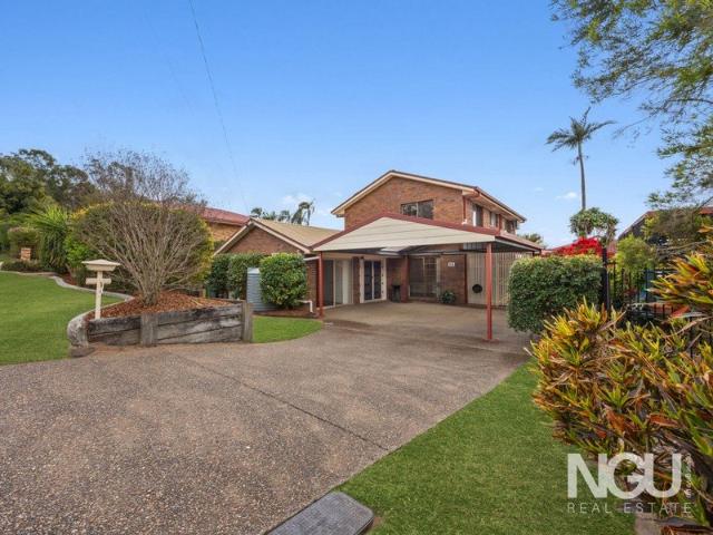 IMPRESSIVE FEATURE PACKED FAMILY HOME WITH A POOL!