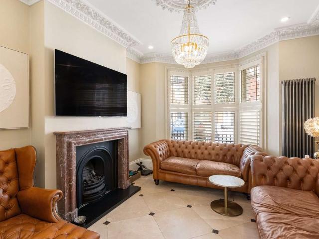 Impressive five bedroom family home with private garden