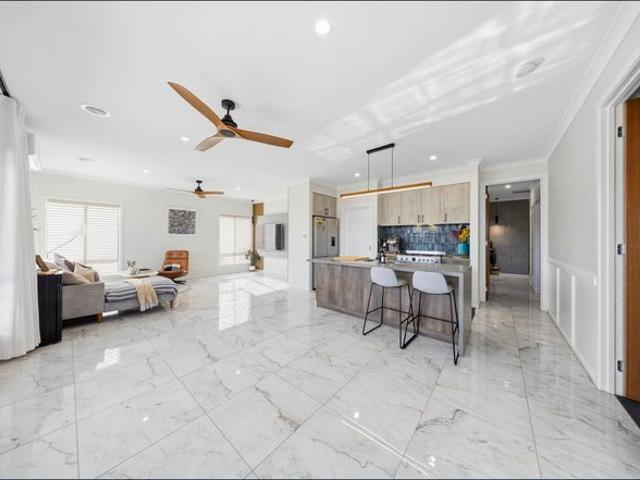 Impressive Four Bedroom Townhouse with Double Garage
