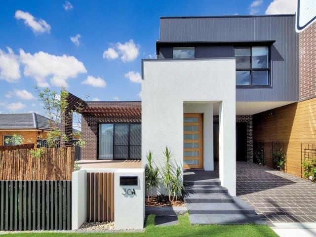 Impressive four bedroom masterpiece nestled on a sought after street