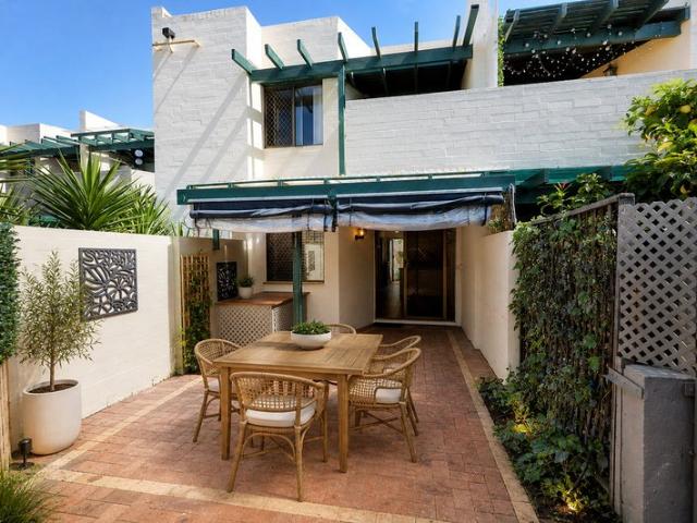 Impressive ground floor unit, with a villa style courtyard