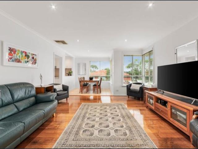 Impressive Home on Inviting Corner Garden