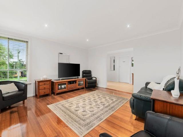 Impressive Home on Inviting Corner Garden