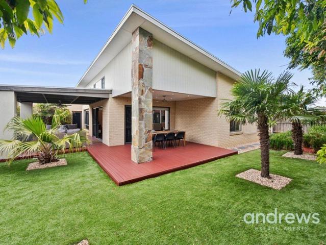 Impressive home with 3 car garage as well