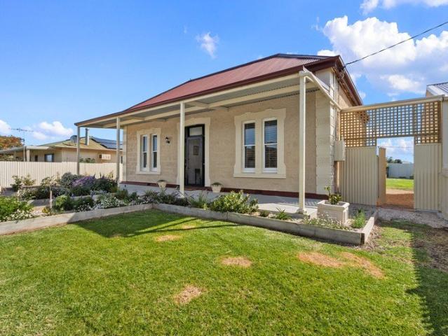 Impressive Immaculately Presented Stone Home by the Sea