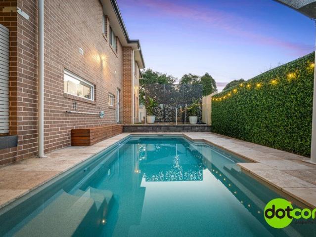 Impressive Large Family Home with Pool & Multiple Living Zones