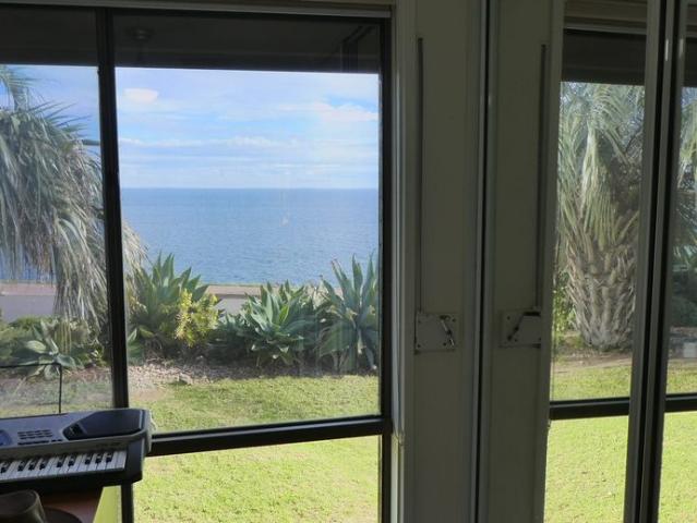 IMPRESSIVE SEA VIEWS FROM THE SEA FRONT FACING WINDOWS AND FRONT GARDEN
