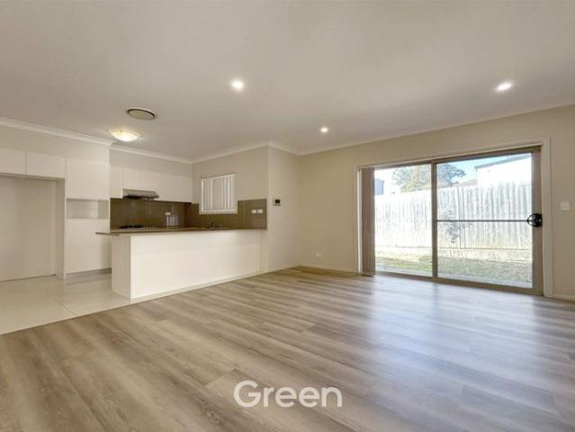 Impressive Split Level Townhouse with Extra Room & Double Lock Up Garage in a Prime Ryde Location