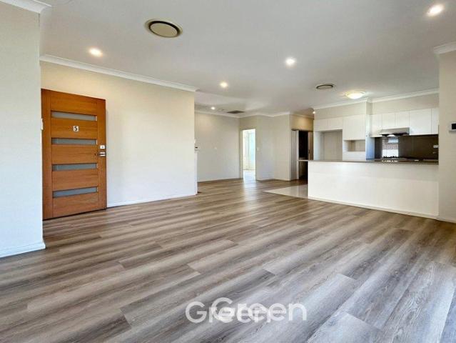 Impressive Split Level Townhouse with Extra Room & Double Lock Up Garage in a Prime Ryde Location