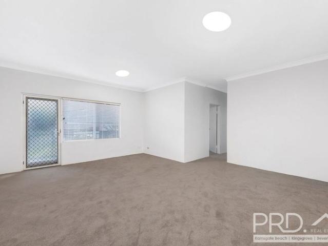 IMPRESSIVE TWO BEDROOM SECURITY UNIT WITH LOCK UP GARAGE