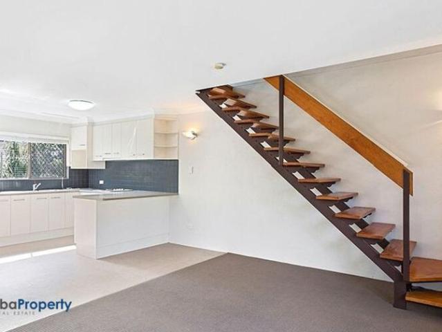 Impressive two bedroom townhouse located close to parks, shops and schools