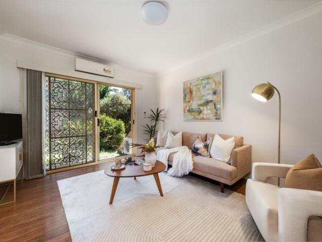 Impressive Townhouse with Courtyard, Balconies & Double Parking in the heart of Five Docks
