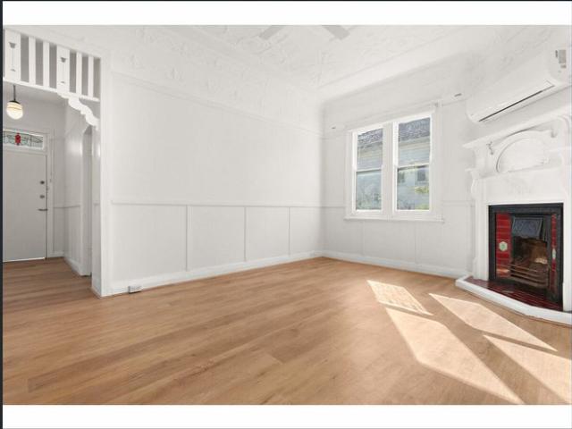 IMPRESSIVELY RENOVATED AIR CONDITIONED FAMILY HOME WITH LARGE GARAGE AND AMPLE PARKING