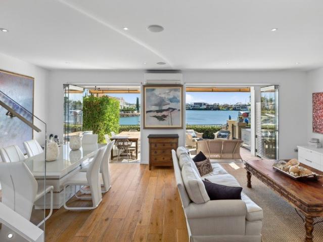 Impressively Renovated & Views Down Main Canal