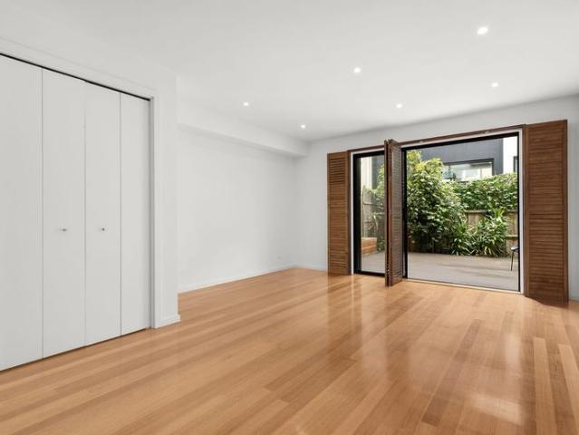 In the Coveted McKinnon Secondary College Zone – Stylish Two Bedroom Townhouse! | FLARE REAL ESTATE