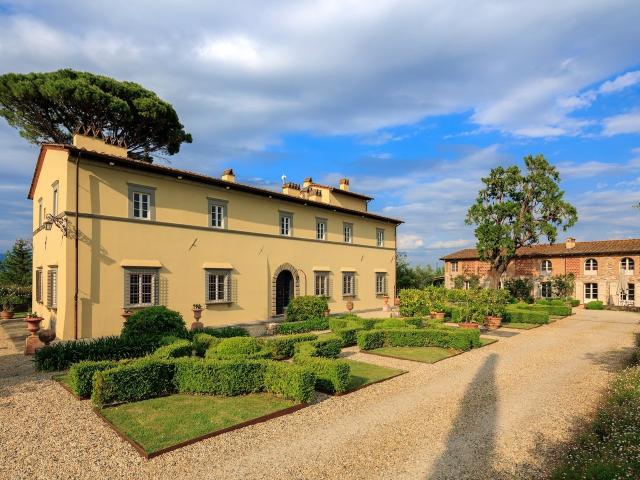 In the enchanting little town called Vicopelago, close to the historic centre of Lucca, Villa Roses rises out of the heart of the Tuscan countryside surrounded by gentle hills dotted with olive groves, vineyards and acacia Woods.On