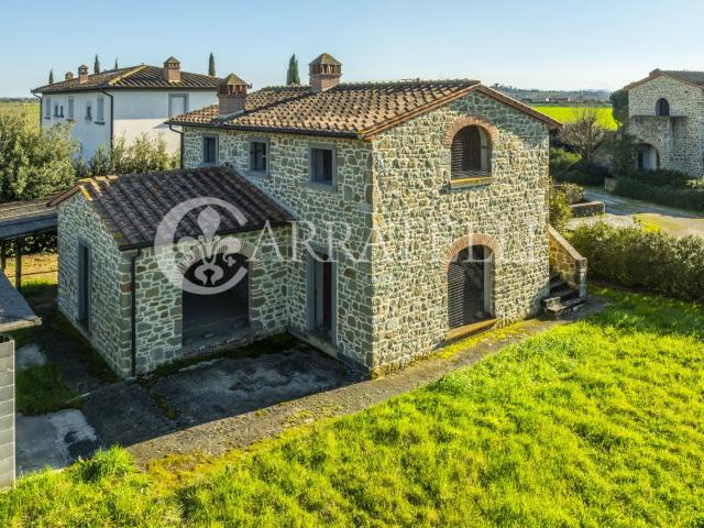 In un incantevole contesto paesaggistico, all'interno di un. 229m² Cortona
