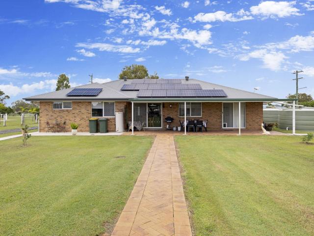 In a serene upscale street, this spacious property offers modern interiors and expansion potential