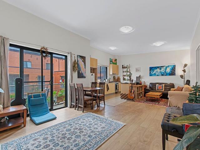 Inner City Living at its Best Serene, Spacious, and Sun Lit Throughout