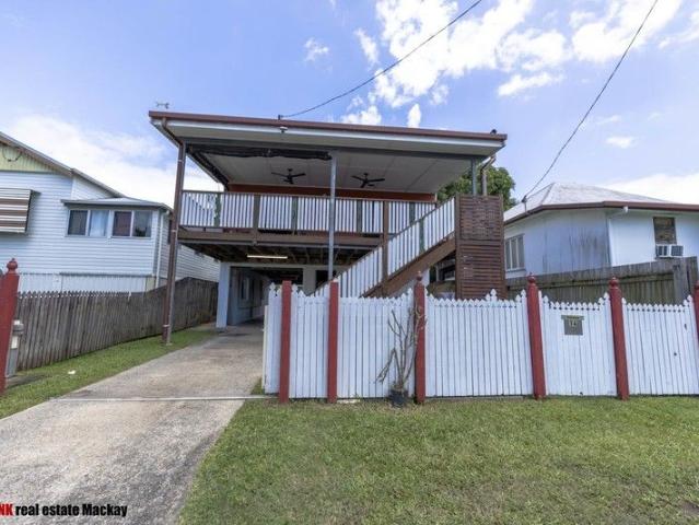 Inner city Property with expansive room and a beautiful large front deck