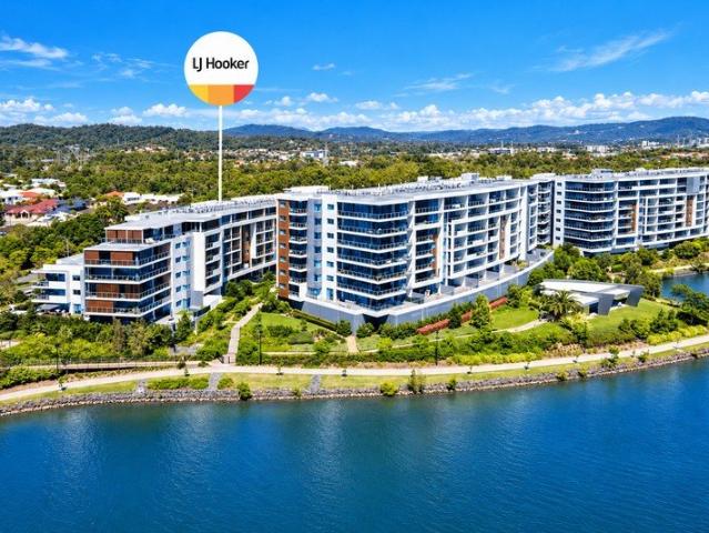 INCREDIBLE LAKESIDE LIFESTYLE LIVING! OPEN PLAN NORTH FACING APARTMENT!