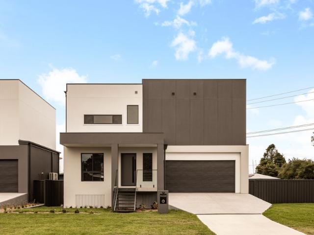 INDULGE IN COASTAL LUXURY LIVING WITH VIEWS OF THE BAY