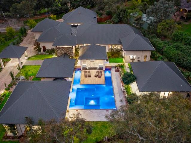 Indulge in Poolside Paradise: Luxury Living Amidst Serene Gardens