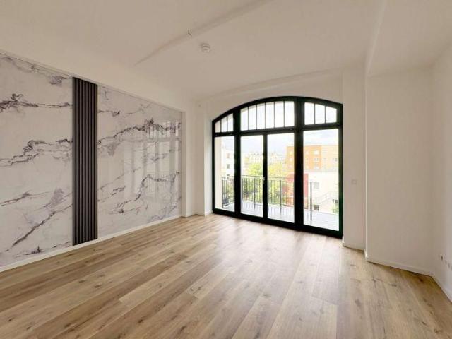 INDUSTRIECHARME NEU GEDACHT / Maisonettewohnung mit Terrasse und Fußbodenheizung