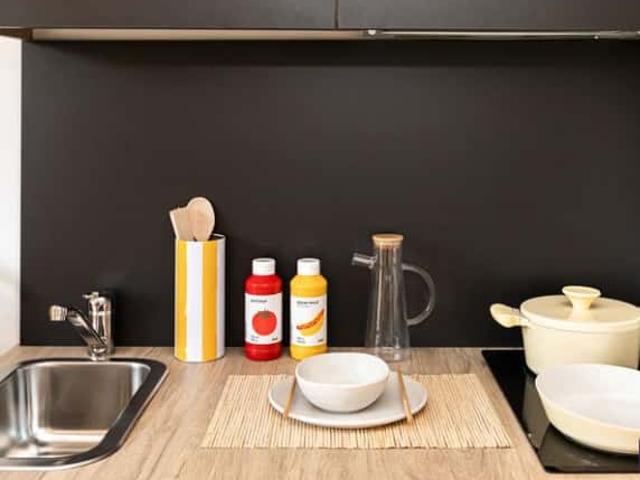 Individual with kitchen