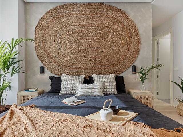 Indonesian Inspired 2 Bedroom Oasis with Vaulted Ceilings and Dedicated Workspace in Almagro, Madrid Amsterdam Apartments for Rent