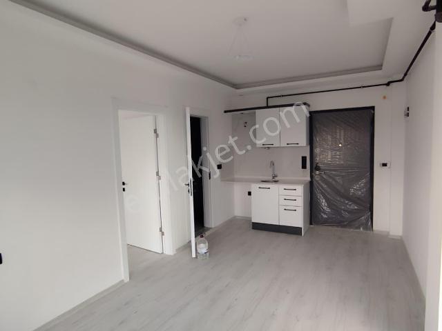 Çine'de Sıfır Binada Sıfır Eşyalı Ara Kat Kiralık 1+1