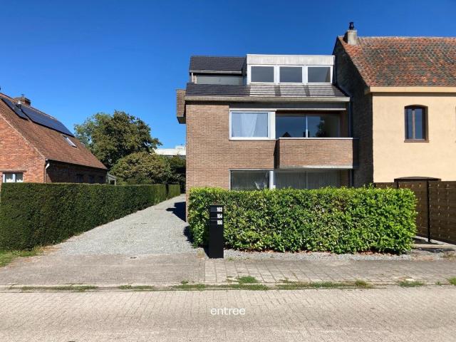 Instapklaar appartement met gemeenschappelijke tuin
