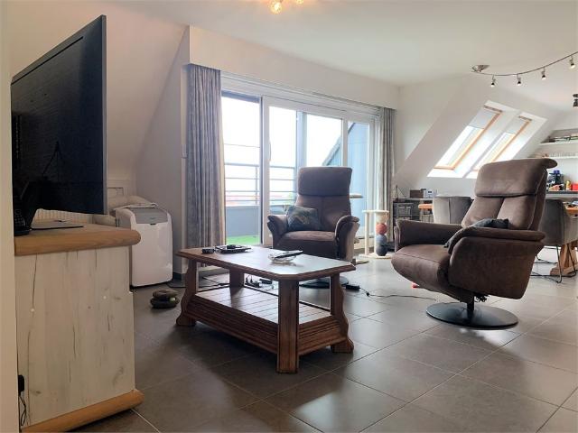 Instapklaar dakappartement met 2 slaapkamers + garage