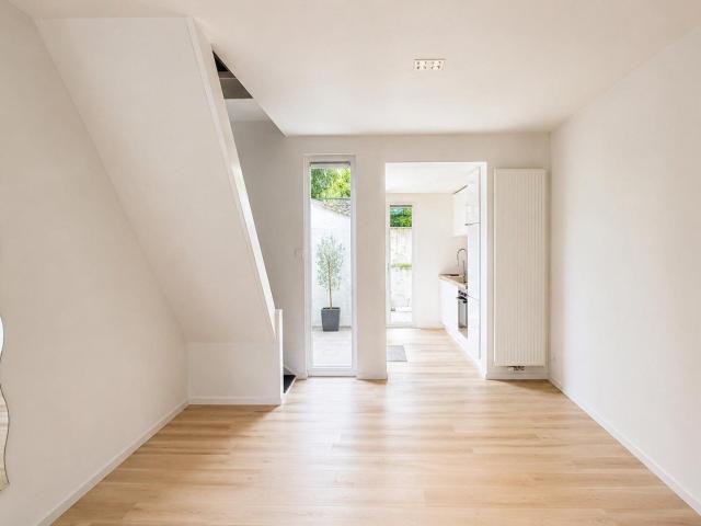 Instapklare woning met 3 slaapkamers en zonnige koer in Gent