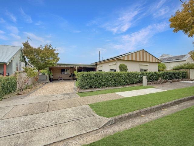 INVEST OR MOVE IN SPACIOUS FAMILY HOME WITH ROOM TO GROW