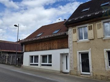 Renditeobjekt mit zwei vermieteten Wohnungen und gemischtem Potenzial
