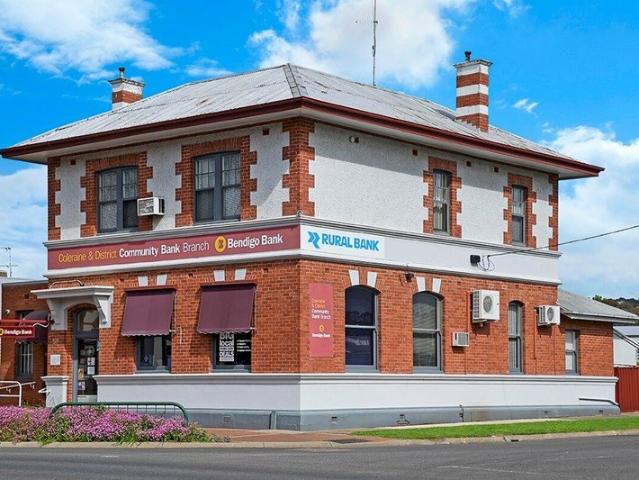 Investment Opportunity Grand Bank Building with Dual Income Potential