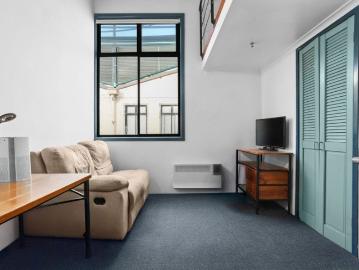 Investment Opportunity Loft Style Studio with Courtyard Views