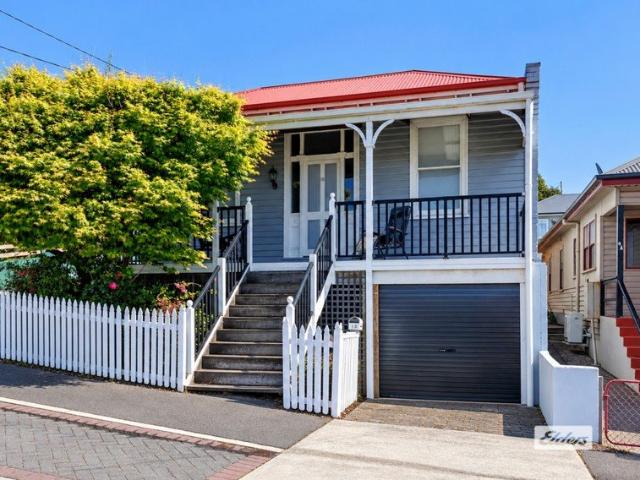 Investment Opportunity with Character, Charm & Coastal Views Just Moments from Town