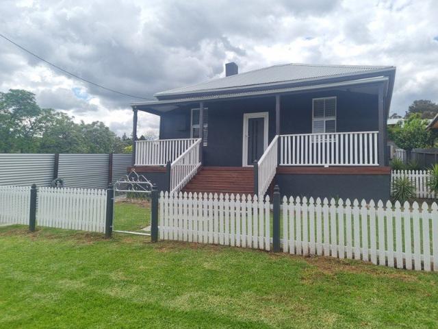 Investment Opportunity with Rear Lane Access