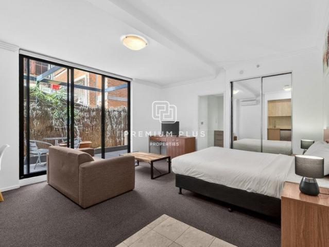 Investment Studio with Rare Courtyard & Car Space in Sydney CBD