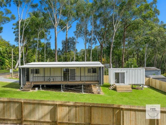 INVESTOR'S DREAM WITH SELF CONTAINED HOME OFFICE!