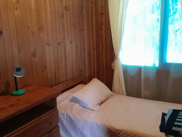 Inversión turística, Casa mas 2 cabañas a metros de la costanera de Villarrica | 6 dormitorios por 11200.00 en Villarrica